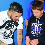 MMA fighter Matt Lagou talks with Swanville Elementary Students