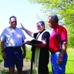 Father Ron Dockendorf blessed 22 farms and gardens around the Grey Eagle area