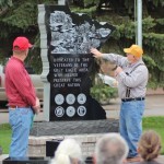 Gordy Reecy (left) stands by as Carl Butler (right) explains the different artwork chosen to represent each war/conflict. Photos by John Young.