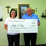 Pictured from left are Hands of Hope Coordinator Michele Miller and Thrivent Financial Associate Carlyle Olsen.